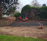 digger and whacker plate in an oldbury garden