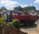 red grabber van outside a house on stourbridge