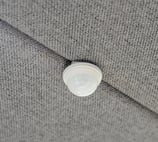 Built-in ceiling-mounted motion sensor on acoustic panel