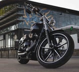 a motorcycle parked in front of a building