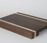 a cutting board with a wooden cutting board