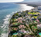 sea side with houses and houses in the background