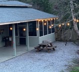 String lights light up the house upon arrival at night. 