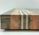 a wooden cutting board with a wooden cutting board