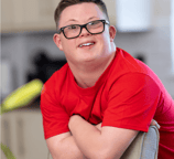 Smiling high school boy with downs