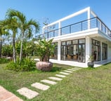 a house with a large deck and a large deck