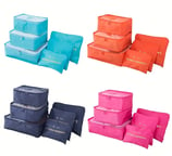 a set of six packing cubes with a variety of items