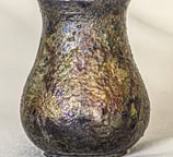 Pear-shaped ceramic vessel made in Amman, Jordan, Kurinuki and Raku, textured with copper, bronze, a
