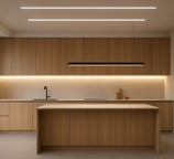 a kitchen with a large wooden counter top and pendant light