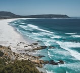 Rolling waves of Noordhoek beach from Chapmands Peak