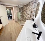 a bathroom with a sink and a mirror