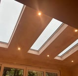 FRESHLY PLASTERED CEILING WITH SKYLIGHT