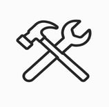 Trust badge icon of hammer and wrench symbolizing professional build quality and licensing