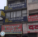 An image showing the facade of Pathkind Labs in Karnal