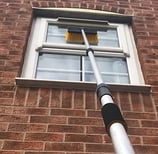 window being professionally cleaned in Malvern 