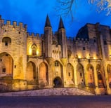 Pope palace in Avignon by night