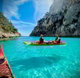 Sea kayak in cristal clear waters in Calanques Cassi