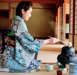 Tea ceremony in Japan on tatami and kimono