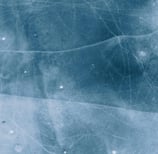 background image - top down view of blue ice cracks