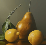 a pear tree with lemons and leaves on a table