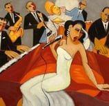 a woman in a white dress and a man in a suit and tie