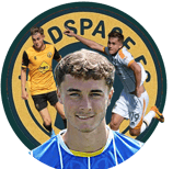 a man in a blue jersey shirt and a soccer player
