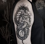Tatouage de Jormungand et des Cornes d'odis sur le bras. Jormungandr and Ondin's horns tattoo.