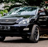Lexus RX 330 parked at Tyrepublic’s Lagos tyre shop with Bridgestone tyres installed