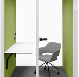 Type T-03: Two-person pod with wide desk and office chair, green walls and ceiling lighting