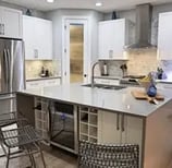 Kelowna custom kitchen with island and built-in wine fridge