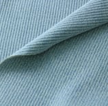 a close up of a blue and white ribbing fabric