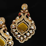 a pair of meenakari earrings