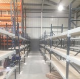 Shelving in Warehouse with chipboard