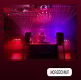 around a dj booth at a nightclub with instagram tag for creechur