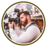a man with a camera and a camera