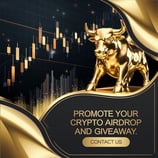 a gold bull statue with a gold bull on it