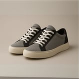 Sepatu kets kanvas SIGNIFO warna abu dengan sol dan tali sepatu putih.