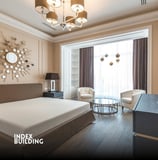 a bedroom with a bed and a mirror