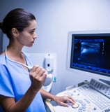 Nurse using ultrasonic device