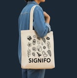 Tas kanvas putih SIGNIFO dengan print custom untuk merchandise.