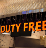 a sign that says duty free on a storefront