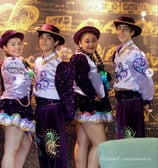 a group of young people in colorful costumes