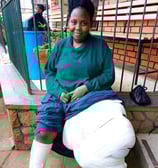 a woman with a castor cast on her leggings