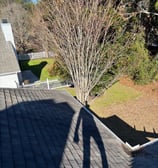 picture of gutter system after studs gutters cleaned it