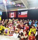 A group of people in Chilean costumes.