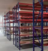 Longspan shelving with chipboard shelves