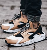 Clothes hanging on a clothes line under a cloudy sky