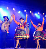 a group of people standing on a stage