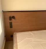 Tête de lit en bois réalisée par Luméo