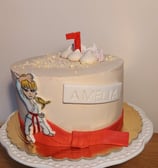 a cake with a cake topperf on it